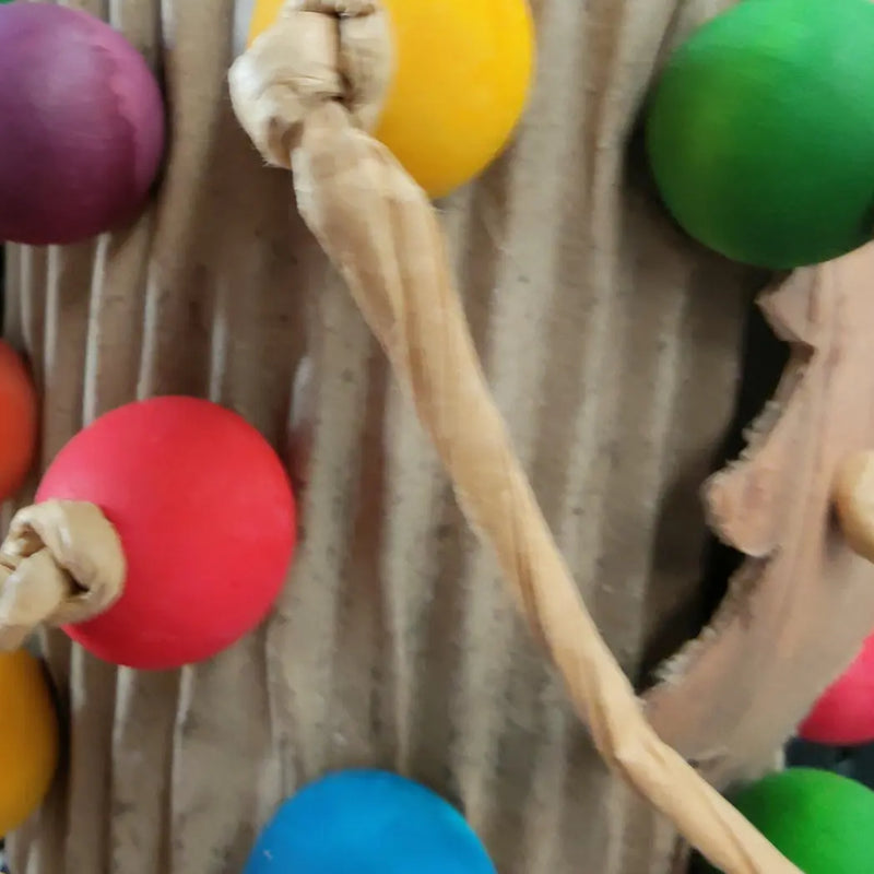 Rolled Cardboard with Beads Bird Toy